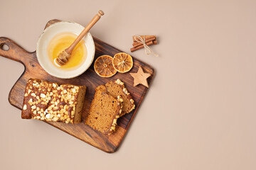 Traditional french spice gingerbread cake with honey, ginger, cinnamon, nutmeg and annis. Christmas dessert, festive sweet food for winter holidays celebration