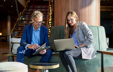 Business partners in a meeting discussing business data