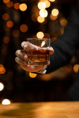 Barman pouring whiskey whiskey glass beautiful night