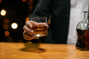 Barman pouring whiskey whiskey glass beautiful night