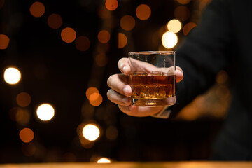 Barman pouring whiskey whiskey glass beautiful night