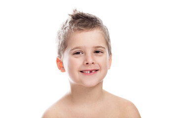 Smiling boy without a front tooth. Change of teeth in children and hygiene. Isolated on white background.