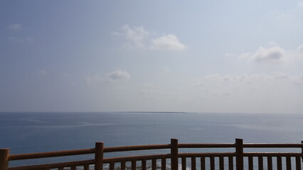 Okinawa, Japan. View from Cape Chinen Park. Horizontal and clam ocean with green nature.