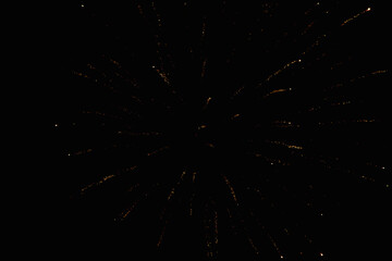 Firework first stage of luminous sparks disintegration