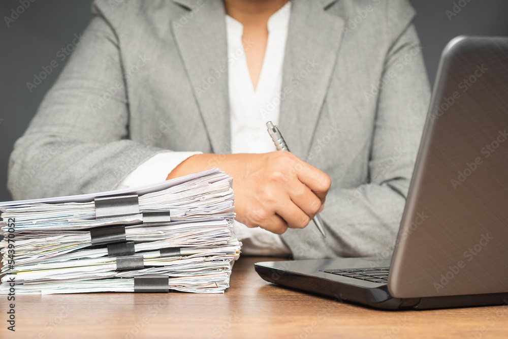 Aufkleber stack of reporting paper documents on a business table in the office