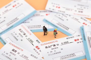 Fototapeta na wymiar Miniature Photography Train Tickets and Passengers Home