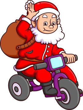 The cute santa claus is riding the bicycle and waving the hand to the children