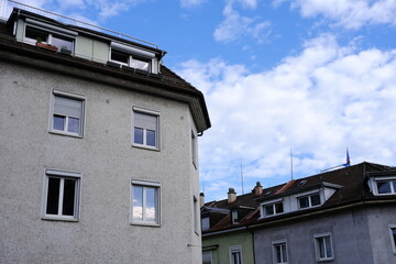 Reflection of White Cloud in the Window of Vintage House in Zurich. (Selective Focus)