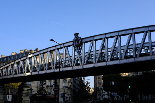 PARIS, FRANCE - AUGUST 27, 2022: Metal Bridge of Cambronne Train Station. Train in Paris that is a Main Public Transportation of the Capital.