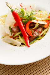 salad with meat and hot pepper
