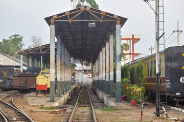 View of Toy train Railway Tracks from the middle during daytime near Kalka railway station in India, Toy train track view, Indian Railway junction, Heavy industry