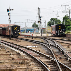 Fototapeta na wymiar View of Toy train Railway Tracks from the middle during daytime near Kalka railway station in India, Toy train track view, Indian Railway junction, Heavy industry
