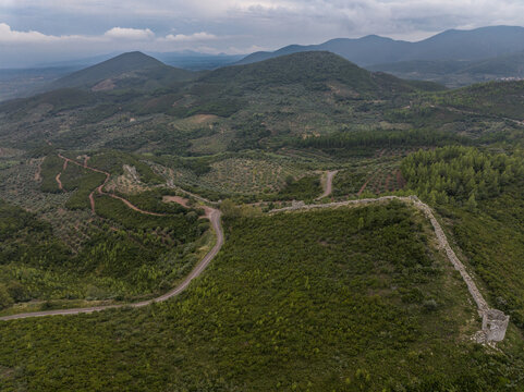 Aerial view of the ancient city walls of Messene with giant stones and rectangular towers  a rival and vasal state to Sparta in ancient Greece