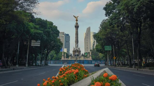 Timelapse time lapse of The Angel of Independence at Paseo de la Reforma , a symbol of Mexico City in the morning, no people 