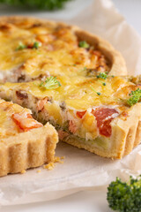 Freshly baked quiche with salmon and broccoli