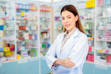 Asian pharmacist woman in pharmacy store