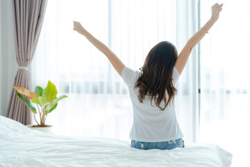 Beautiful girl waking up in the morning.