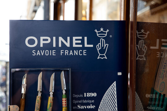 opinel savoie france logo sign and text brand french company specialized knife classic steel and wooden