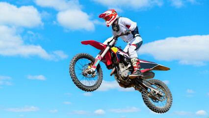 View of a jumping motorcyclist at a motocross race in Chisinau, Moldova