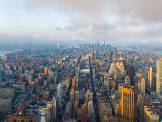 Manhattan skyscrapers at sunrise. Panoramic skyline view of New York City towards lower Manhattan - 544015681