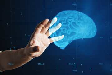 Close up of businessman hand holding creative blue brain hologram on blurry background. Neurology,...