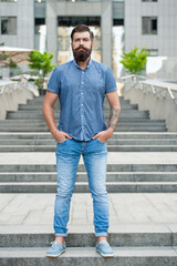 bearded man outside. full length of bearded man with beard. hipster bearded man outdoor