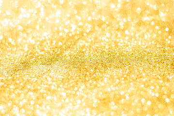 Gold glitter defocused texture background. gold christmas abstract background.