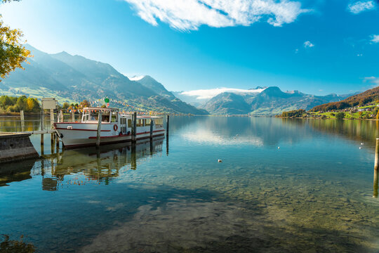 Switzerland, Obwalden, Sarnen, Ferry moored on shore of Lake Sarnen