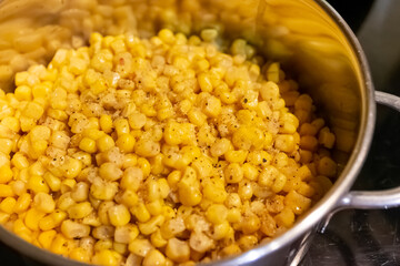 saucepan full of yellow corn