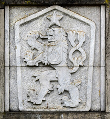 State emblem, symbol of communist Czechoslovakia, a two-tailed lion with a five-pointed star,...