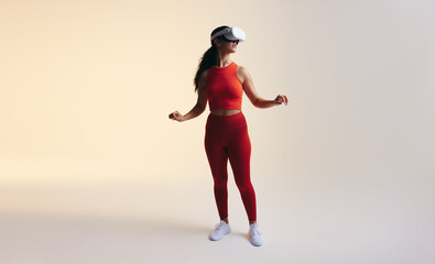 Fototapeta na wymiar Young woman exploring 3D technology