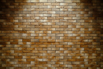 Brick Wall Background with Spotlight from the Top.