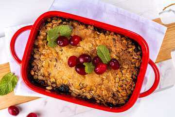 Winter homemade gluten free cranberry oats crumble pie. Sweet delicious cranberry oatmeal crumble,...