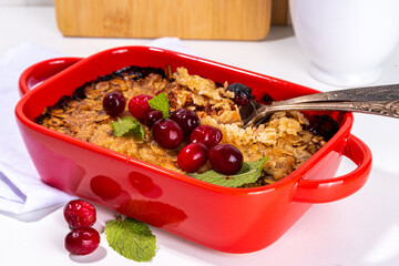 Winter homemade gluten free cranberry oats crumble pie. Sweet delicious cranberry oatmeal crumble,...