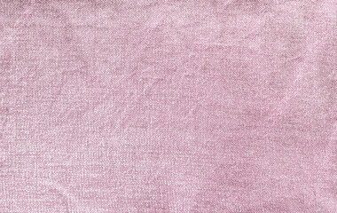 Pink denim fabric texture background. Firm and thick cotton fabric backdrop.