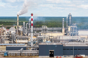 aerial panoramic view on smoke of pipes of chemical or wooden enterprise plant. Industrial landscape environmental pollution waste plant. Air pollution concept.