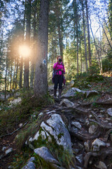 Obraz premium Woman hiker with camera