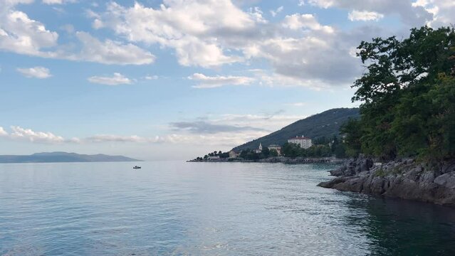 Town of Lovran at Adriatic sea in croatian Kvarner bay in summer sunset