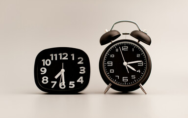 Black clock on gray background, time concept that matters to life and work. - Powered by Adobe
