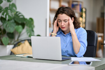 Stressed tired dizzy young lady, professional business woman employee office worker touching head...