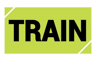 TRAIN text written on green-black stamp sign.