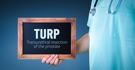 Transurethral resection of the prostate (TURP). Doctor shows sign/board with wooden frame. Background blue - obrazy, fototapety, plakaty