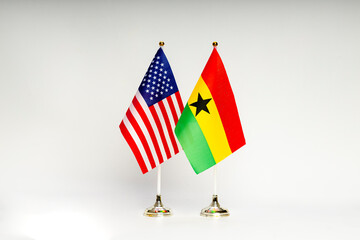 State flags of the USA and Ghana on a light background.