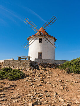 An ancient windmill at the northern tip of Cap Corse in Corsica, France