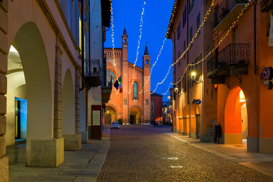Old town of Alba with Christmas illumination in the evening.