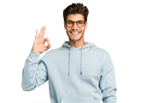 Young caucasian handsome man isolated cheerful and confident showing ok gesture.