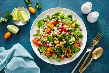 Poster Tabbouleh salad. Tabouli salad with fresh parsley, onions, tomatoes, bulgur and chickpea. Healthy vegetarian food, diet. Top view © Sea Wave
