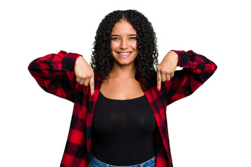 Young cute brazilian woman isolated points down with fingers, positive feeling. © Asier