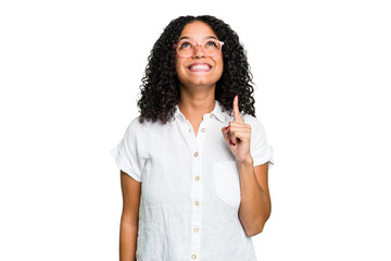Young cute brazilian woman isolated indicates with both fore fingers up showing a blank space.