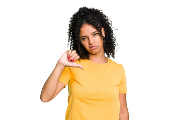 Young cute brazilian woman isolated showing a dislike gesture, thumbs down. Disagreement concept.